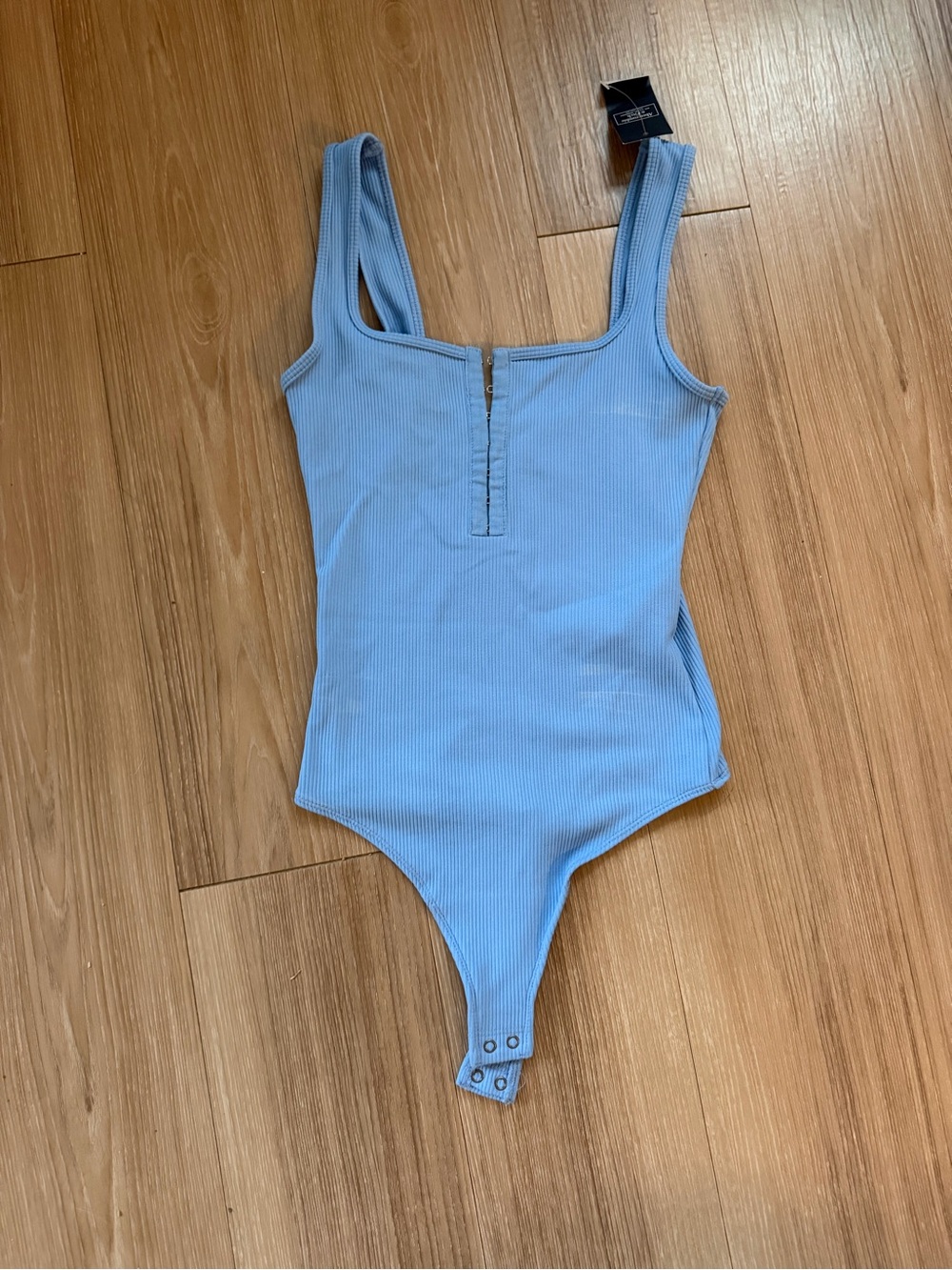 Ribbed Light Blue One-Piece Bodysuit with Front Latches
